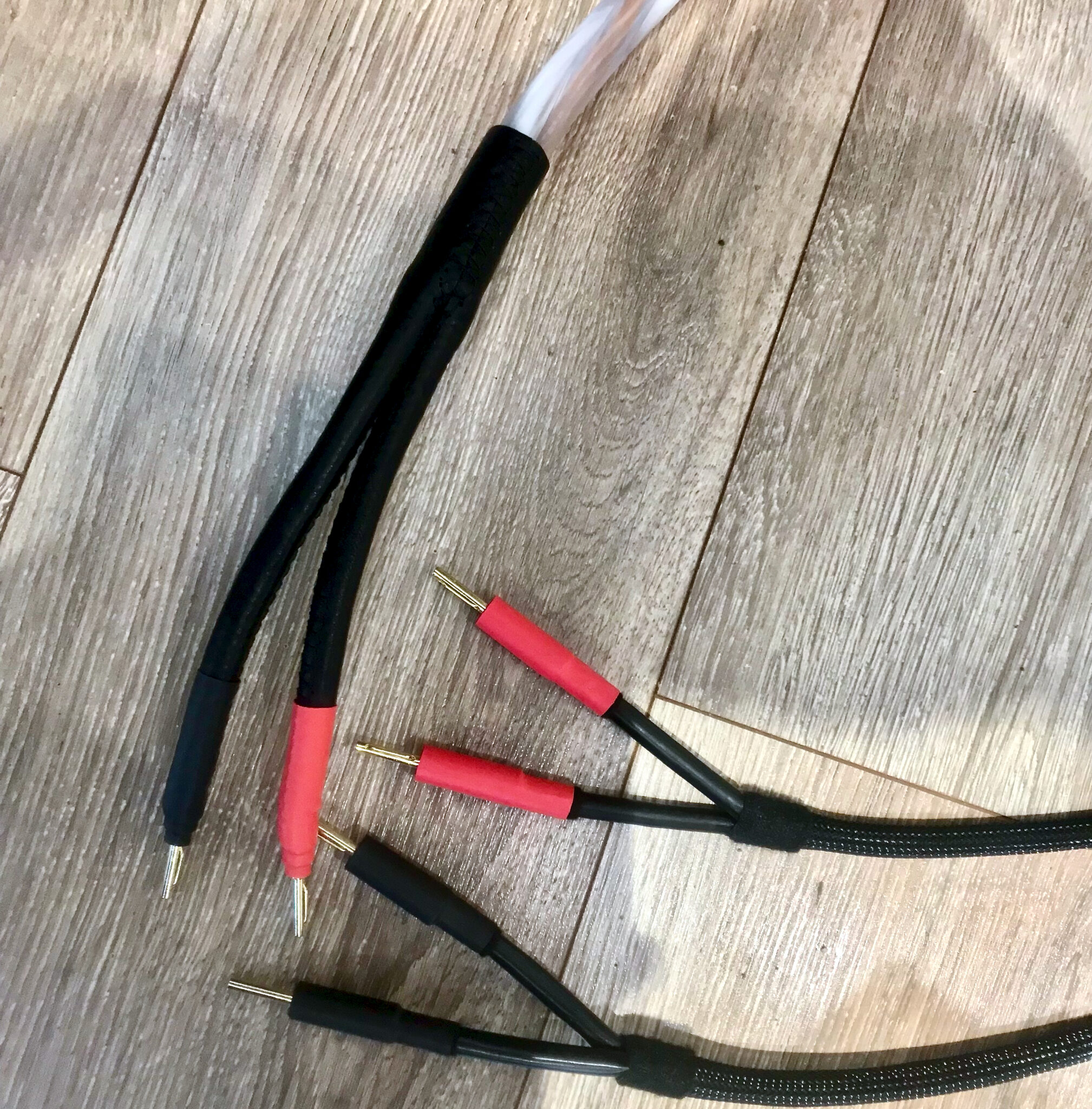 Speaker cables together
